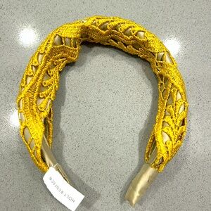 This beautiful head band is new with tag from Holt Renfrew.